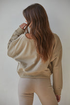 ON THE GO OFF-THE-SHOULDER SWEATSHIRT